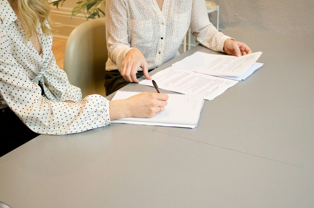 confident businesswoman leading meeting